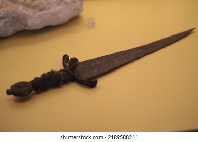 Old Roman Dagger On A Glass Case