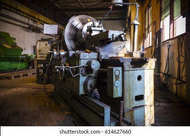 Old Rotary Lathe Machine Tool Equipment In Factory Interior