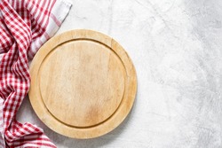 Round wooden cutting board isolated on white background Stock Photo by  AnatoliySadovskiy