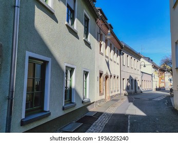 Old Row Houses In A Small Alley In An Old German Town On Asunny Day With Blue Sky