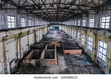 Old Ruined Abandoned Concrete Factory Interior, Aerial View.