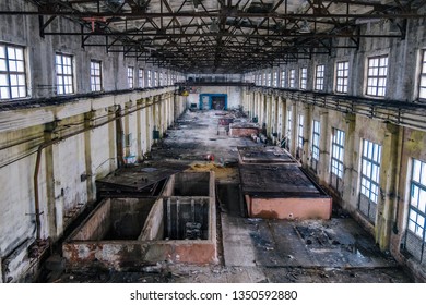 Old Ruined Abandoned Concrete Factory Interior, Aerial View.