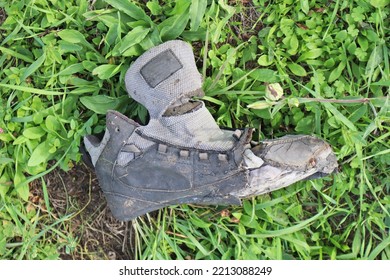 Old Ruined Brogue Shoe In The Grass