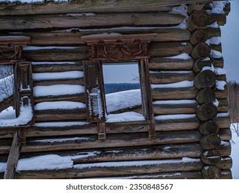 An old ruined house, Rostov. Broken windows, a collapsed, snow-covered house. Loneliness, abandonment, alienation. Russia.