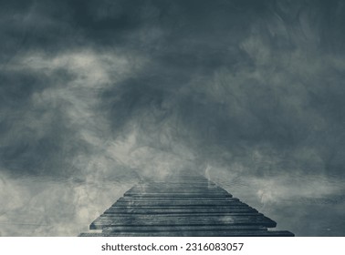 Old ruined wooden pier and dark cloudy sky, horror and darkness background - Powered by Shutterstock