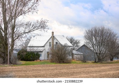 An Old Rural Farmhouse In Spring In Ontario, Canada