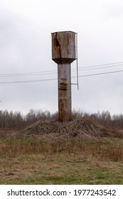 Old Rural Water Tower In The Field