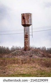 Old Rural Water Tower In The Field