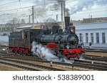 Old russian steam locomotive series Ov, builded in 1904, at railway station.