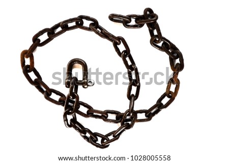 Old rust chain, shackle or manacle on white background