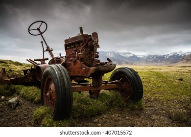 Old Rusted Abandoned Tractor On A Farm 