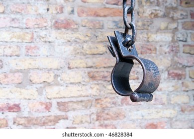 old rusted iron rings on wall background