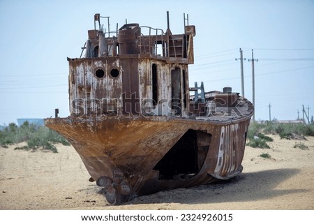 old rusted iron ships in aral sea