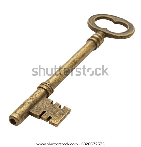 Old rustic brass key isolated