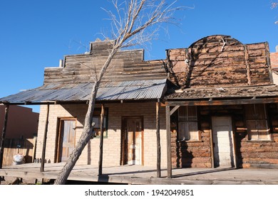 Old Rustic Buildings, Windmill And Stage Coach In Tombstone AZ