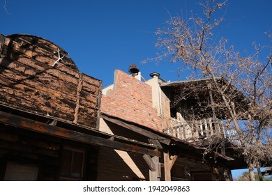 Old Rustic Buildings, Windmill And Stage Coach In Tombstone AZ