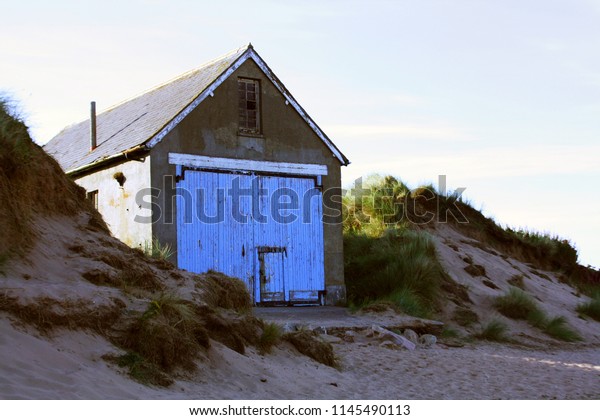 Old Rustic Cabin On Beach Blue Stock Photo Edit Now 1145490113