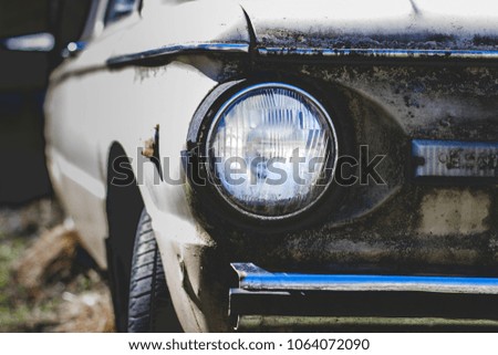 Old rustic car headlight