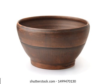 Old rustic clay bowl isolated on white