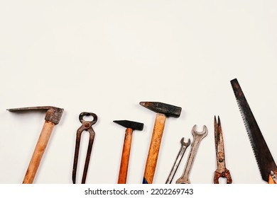 Old And Rustic Handy Working Tools On The White Background