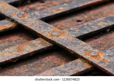 Old Rustic Metal Bar Mesh Welded Together In Cross Pattern