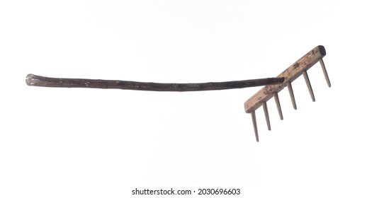 Old Rustic Rake Isolated On White Background