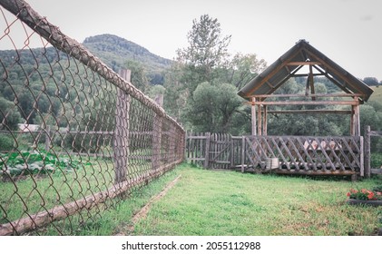 An old rustic traditional cnain fence colored - Powered by Shutterstock