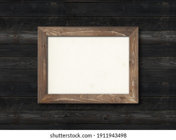 Old Rustic Wooden Picture Frame Hanging On A Black Wood Wall. Horizontal Picture. Blank Mockup Template