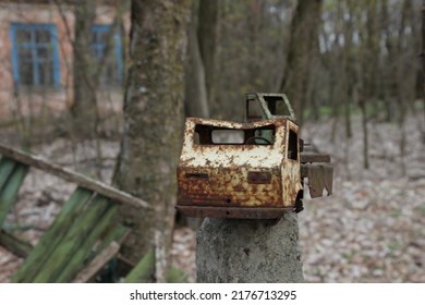 Old Rusty Abandoned Toy In The Forest