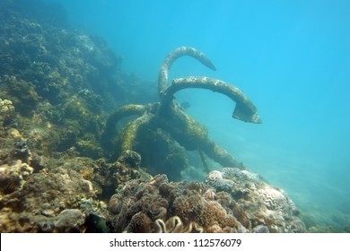 Old Rusty Anchor With Broken Line Underwater