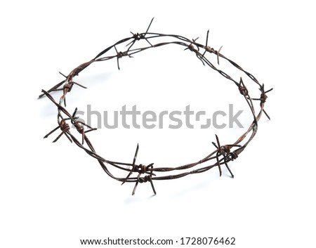 Old rusty barbed wire circle isolated on white background