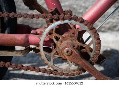 Old Rusty Bike Chain On Stone Background