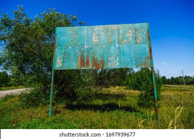 Old rusty billboard in ghost town Pripyat Chornobyl Zone