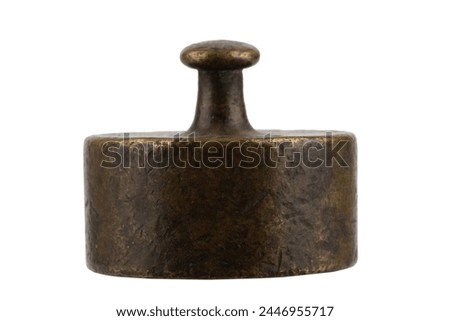 Old rusty bronze scale weights isolated on white