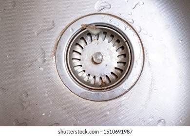 Old Rusty Calcified Drain Hole In The Kitchen Sink With Limescale And Scurf Scum.