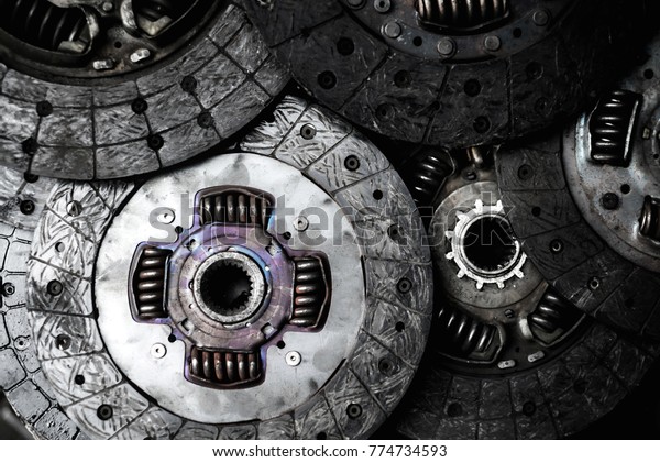 Old and rusty car clutch\
plate disk