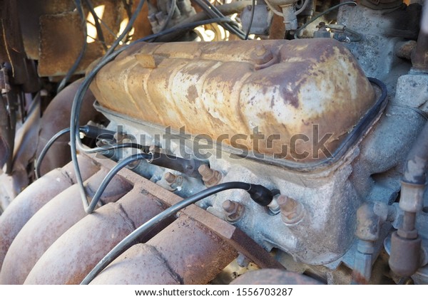 old rusty car engine\
motor close up