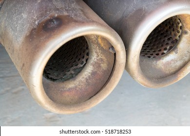 Old And Rusty Car Exhaust Pipe