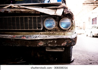 Old rusty car headlight