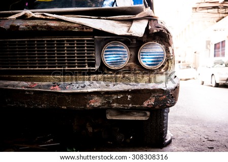 Old rusty car headlight