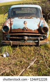 Old, Rusty Car Wreck Front And Lamp Outdoor