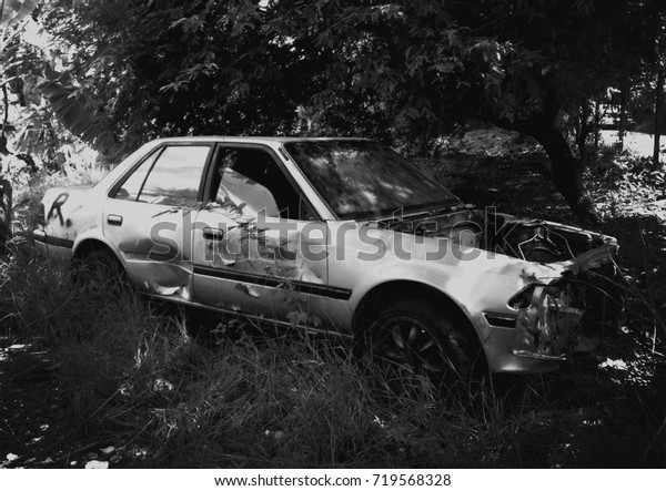 Old Rusty
Car Wreck in Scary Junk Yard / Loneliness and Mysterious Concept /
Halloween Theme / Monochrome Style
