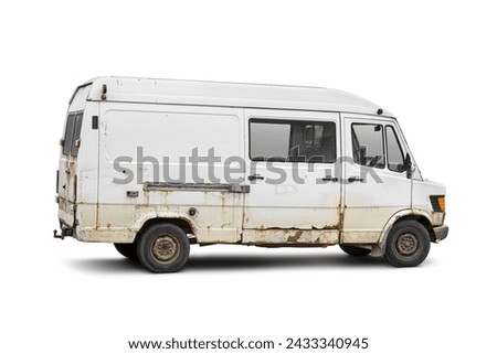 Old rusty dirty delivery van side view isolated on a white background. Cargo short-base minibus. Vehicle recycling concept.