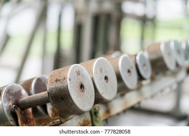 Old Rusty Dumbells Row In The Park