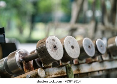 Old Rusty Dumbells Row In The Park