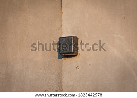 old rusty gates with padlocks