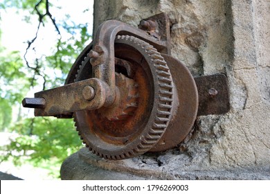 Old And Rusty Gear, Pulley And Crank Mechanism