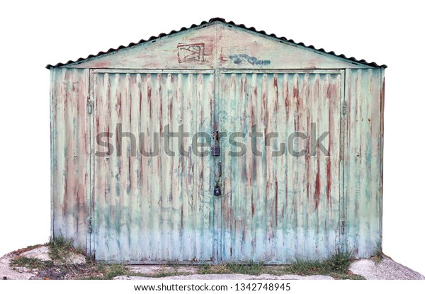 old rusty green metal car garage box isolated on\
white background closeup