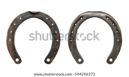 Old rusty horseshoe isolated on white background. Symbol of luck concept.
