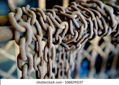 Old rusty industrial chains.